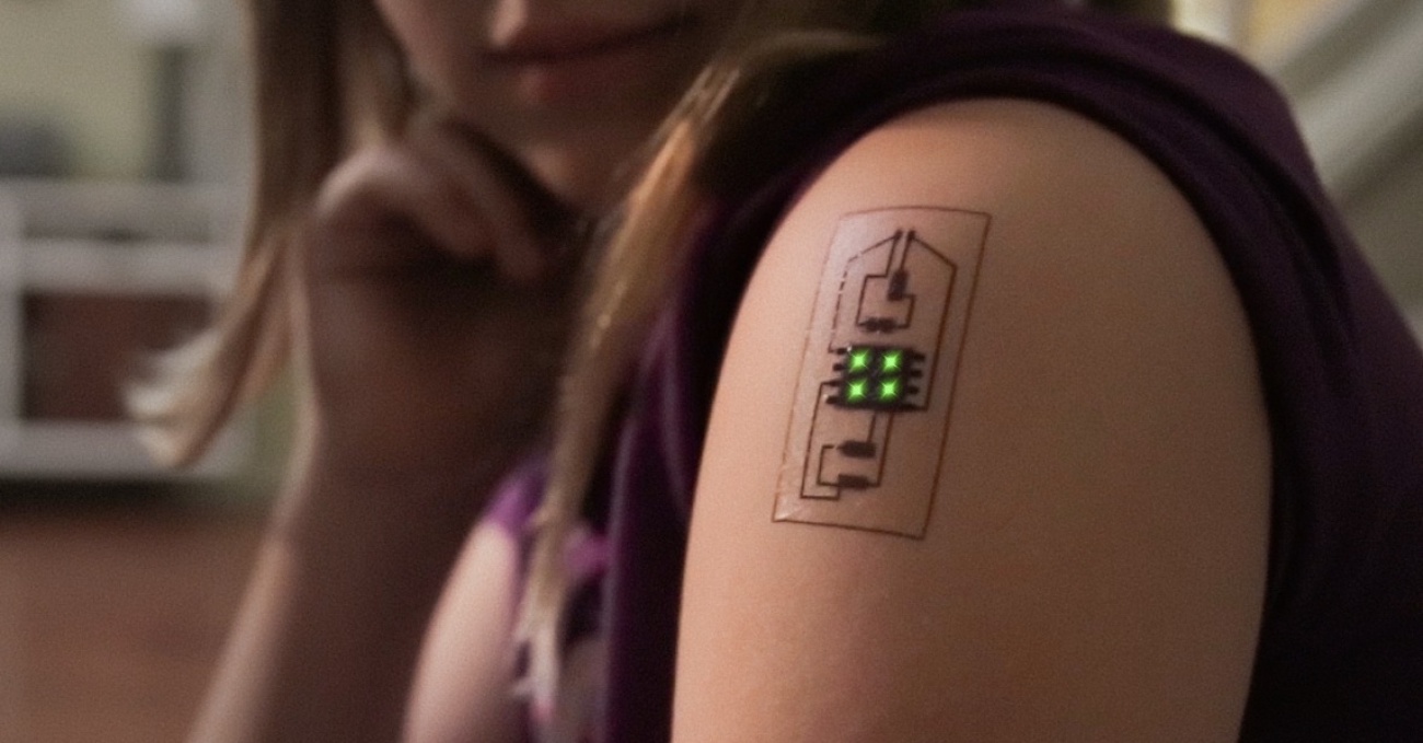 Smart tattoo with electrodes. Step towards the robotics of a person or a fad?