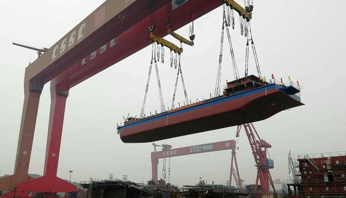 The electric cars? Pfft... the Chinese have built the cargo ship on batteries
