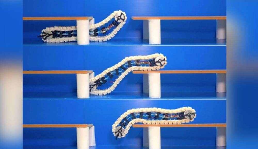 Watch as the robot-caterpillar jumps over obstacles